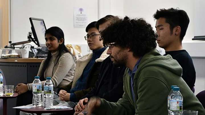 Students sat in seminar environment
