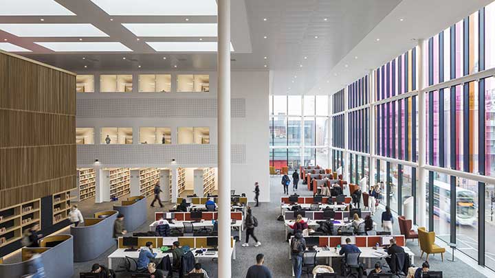 Students working inside AMBS building