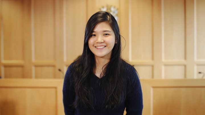 Law student in moot court looking to camera