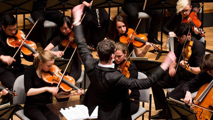 Lively conductor with the symphony orchestra