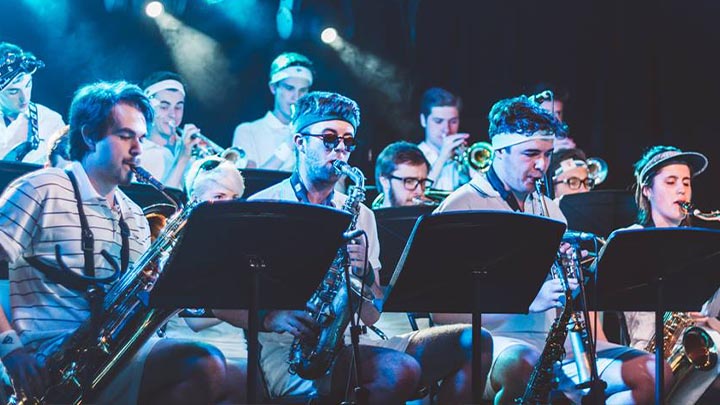 The UoM Big Band saxophonists performing in Hawiian shirts