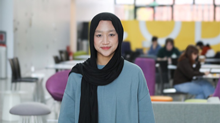 A pharmacy student in the library.